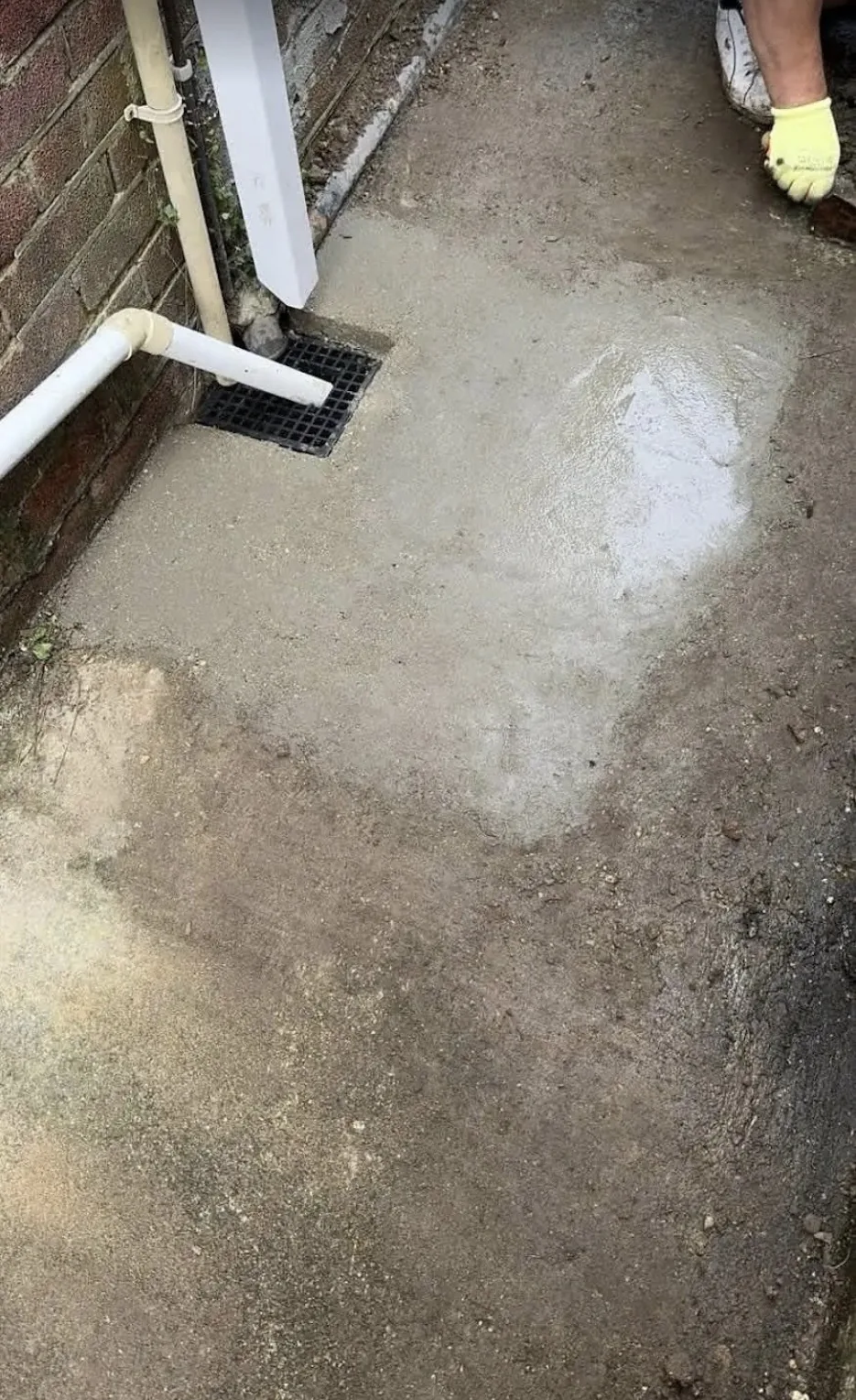 Drain repair reinstated and finished in concrete